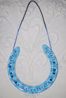 Blue with beads and hanging thread. SOLD.